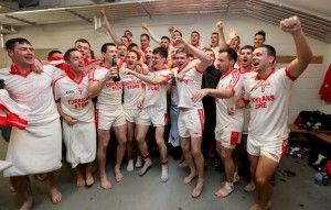 Mayo's number one side Ballintubber take the celebrations to the changing rooms.