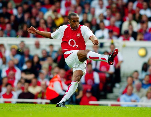 LONDON - MAY 4:  Thierry Henry of Arsenal shoots at goal during the FA Barclaycard Premiership match between Arsenal and Leeds United held on May 4, 2003 at Highbury, in London. Leeds United won the match 3-2. (Photo by Ben Radford/Getty Images)