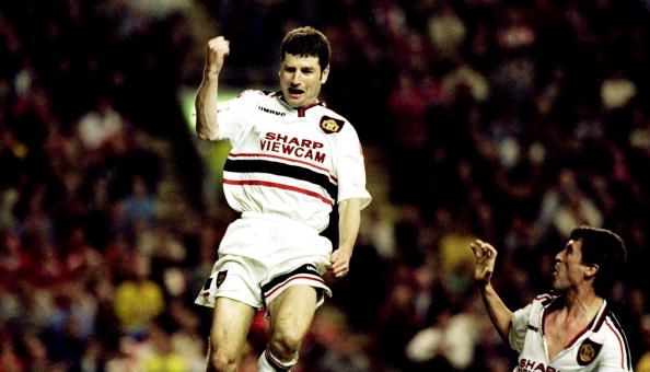 Dennis Irwin and Roy Keane of Manchester United