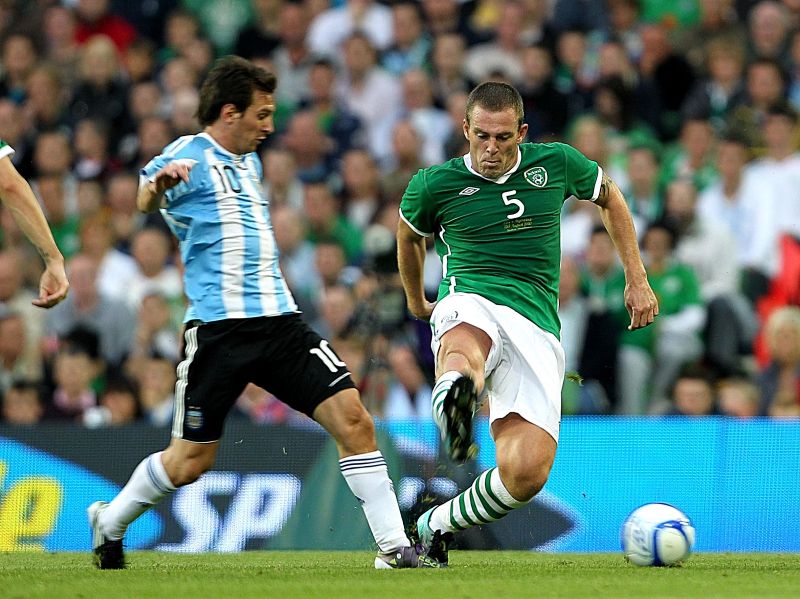 International Friendly 11/8/2010 Republic of Ireland vs Argentina Ireland's Richard Dunne and Lionel Messi of Argentina Mandatory Credit ©INPHO/Lorraine O'Sullvian *** Local Caption ***