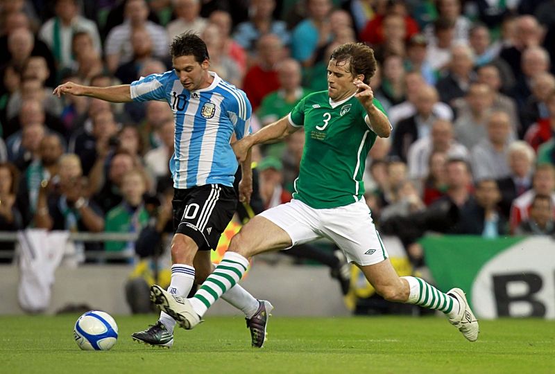 International Friendly 11/8/2010 Republic of Ireland vs Argentina Lionel Messi of Argentina with Kevin Kilbane of Ireland Mandatory Credit ©INPHO/Donall Farmer *** Local Caption ***
