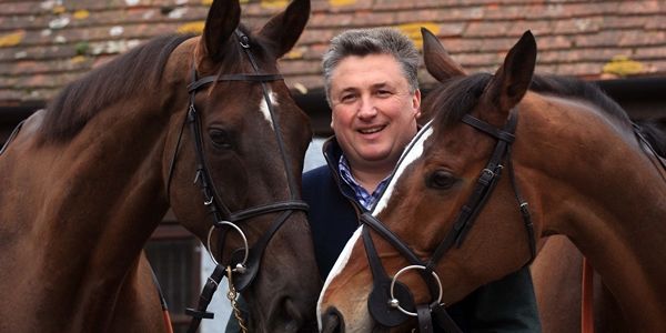 DITCHEAT, ENGLAND - FEBRUARY 20: Trainer Paul Nicholls parades a number of his Cheltenham National Hunt Festival bound horses at a media open day at hiis stables at Ditcheat near Wincanton on February 20, 2008, in Ascot, England. (R) Kauto Star (L) Debham both of which are running in The Gold Cup. (Photo by Julian Herbert/Getty Images)