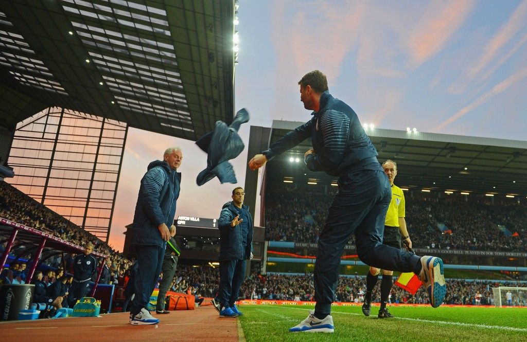 BIRMINGHAM, ENGLAND - APRIL 07: Tim Sherwood manager of Aston Villa throws his jacket in celebration as Christian Benteke of Aston Villa scores their first and equalising goal during the Barclays Premier League match between Aston Villa and Queens Park Rangers at Villa Park on April 7, 2015 in Birmingham, England. (Photo by Michael Regan/Getty Images,)
