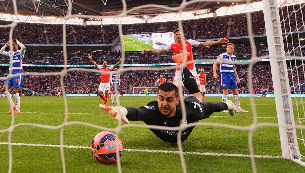 LONDON, ENGLAND - APRIL 18: Adam Federici of Reading stretches for the ball as he fails to stop a shot by Alexis Sanchez of Arsenal for their second goal during the FA Cup Semi Final between Arsenal and Reading at Wembley Stadium on April 18, 2015 in London, England. (Photo by Mike Hewitt/Getty Images)