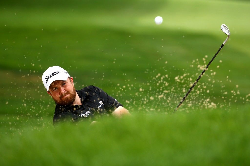 AKRON, OH - AUGUST 09: Shane Lowry of Ireland hits out of a bunker near the 11th green during the final round of the World Golf Championships - Bridgestone Invitational at Firestone Country Club South Course on August 9, 2015 in Akron, Ohio. (Photo by Richard Heathcote/Getty Images)