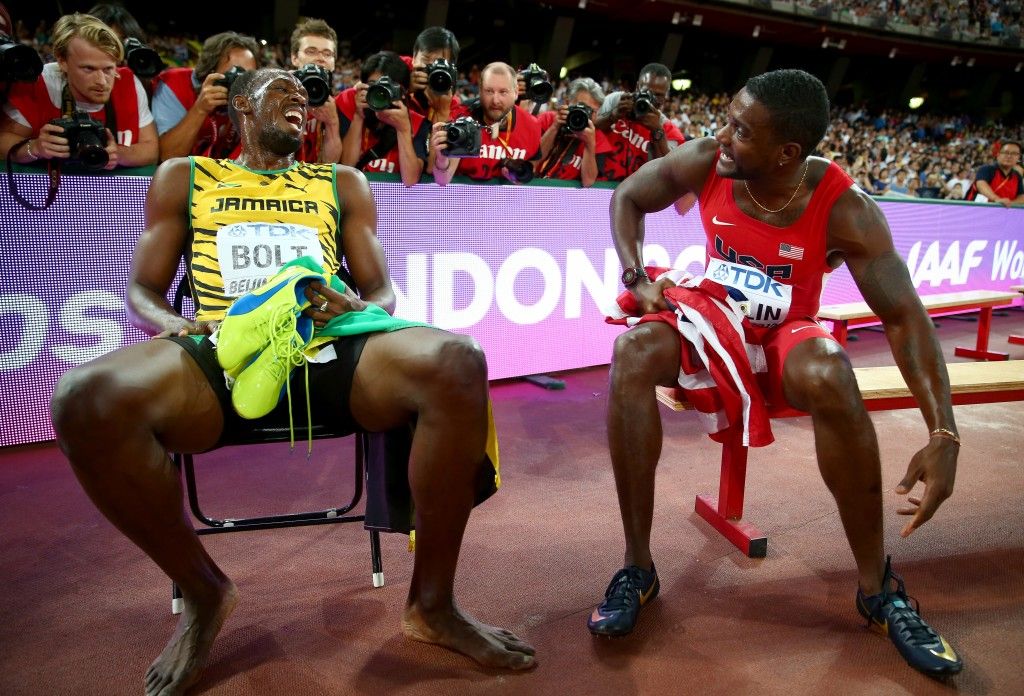 BEIJING, CHINA - AUGUST 27: Gold medalist Usain Bolt of Jamaica talks with silver medalist Justin Gatlin of the United States after the Men's 200 metres final during day six of the 15th IAAF World Athletics Championships Beijing 2015 at Beijing National Stadium on August 27, 2015 in Beijing, China. (Photo by Michael Steele/Getty Images)