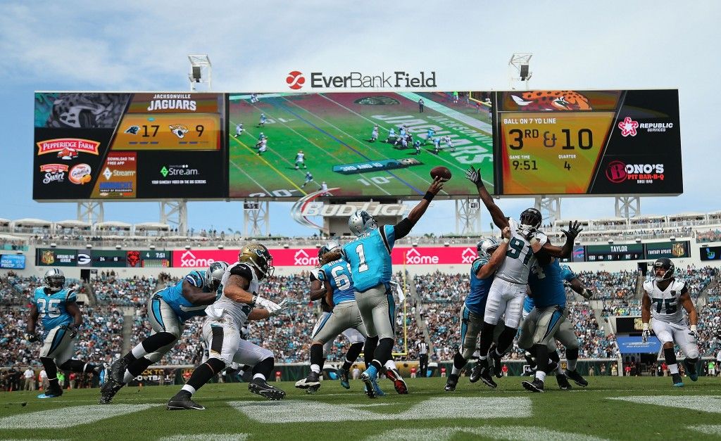 JACKSONVILLE, FL - SEPTEMBER 13: Cam Newton #1 of the Carolina Panthers passes during a game against the Jacksonville Jaguars at EverBank Field on September 13, 2015 in Jacksonville, Florida. (Photo by Mike Ehrmann/Getty Images)