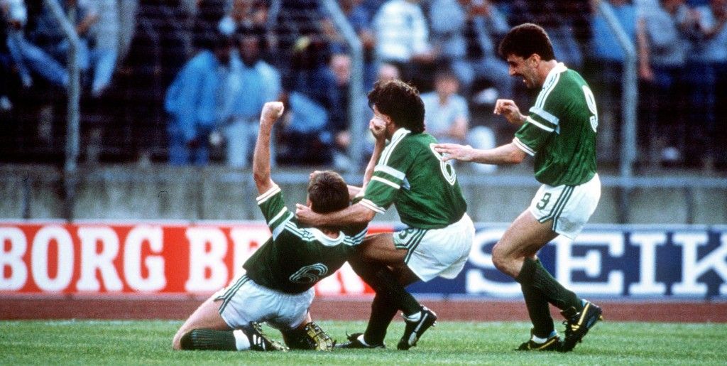 European Championships Republic of Ireland vs USSR 15/6/1988 Ireland's Ronnie Whelan is congratulated after scoring by Ray Houghton and John Aldridge Mandatory Credit ©INPHO/Billy Stickland