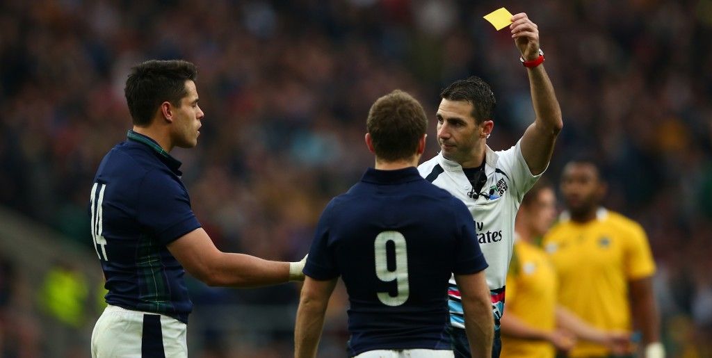 LONDON, ENGLAND - OCTOBER 18: Referee Craig Joubert shows the yellow card to Sean Maitland (L) of Scotland during the 2015 Rugby World Cup Quarter Final match between Australia and Scotland at Twickenham Stadium on October 18, 2015 in London, United Kingdom. (Photo by Dan Mullan/Getty Images)