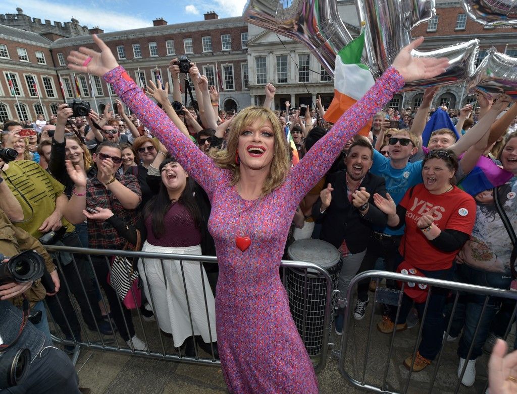 DUBLIN, IRELAND - MAY 23: Drag queen artist and Yes campaign activist, Panti Bliss joins supporters in favour of same-sex marriage celebrate and cheer as thousands gather in Dublin Castle square awaiting the referendum vote outcome on May 23, 2015 in Dublin, Ireland. Voters in the Republic of Ireland are taking part in a referendum on legalising same-sex marriage on Friday. The referendum was held 22 years after Ireland decriminalised homosexuality with more than 3.2m people being asked whether they want to amend the country's constitution to allow gay and lesbian couples to marry. (Photo by Charles McQuillan/Getty Images)