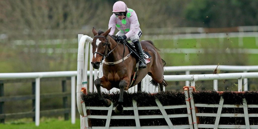 Punchestown Racing, Punchestown Racecourse, Kildare 9/1/2016 The Sky Bet Moscow Flyer Novice Hurdle Min ridden by Ruby Walsh clears the last on the way to winning the race Mandatory Credit ©INPHO/Donall Farmer