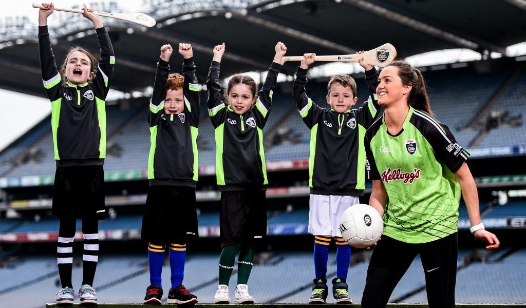12 April 2016; TV star Moone Boy, David Rawle, joined a host of GAA stars today at Croke Park to launch Kellogg’s GAA Cúl Camps 2016. The summer camps attract over 100,000 children and are hosted in more than 1,000 locations nationwide. Costing just Ä55 for a full week of fun, coaching and a free kit, Kellogg’s is on a mission for the promotion of nutrition coupled with physical activity. Sign up for Kellogg’s GAA Cúl Camps at www.kelloggsculcamps.gaa.ie. Pictured is Armagh ladies footballer Aimee Macken with children from Gaelscoil Cholaiste Mhuire. Croke Park, Dublin. Picture credit: Ramsey Cardy / SPORTSFILE