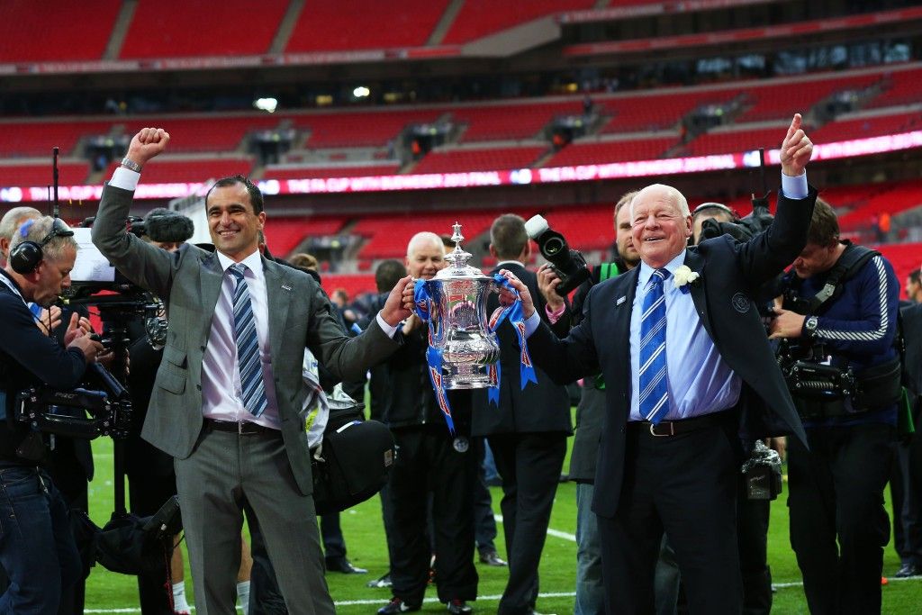 LONDON, ENGLAND - MAY 11:  (L-R) Manager Roberto Martinez of Wigan Athletic and Wigan chairman Dave Whelan celebrate with the trophy following his team's 1-0 victory during the FA Cup with Budweiser Final between Manchester City and Wigan Athletic at Wembley Stadium on May 11, 2013 in London, England.  (Photo by Alex Livesey/Getty Images)