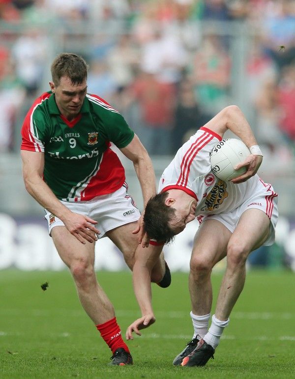 Seamus O'Shea tackles Colm Cavanagh 25/8/2013