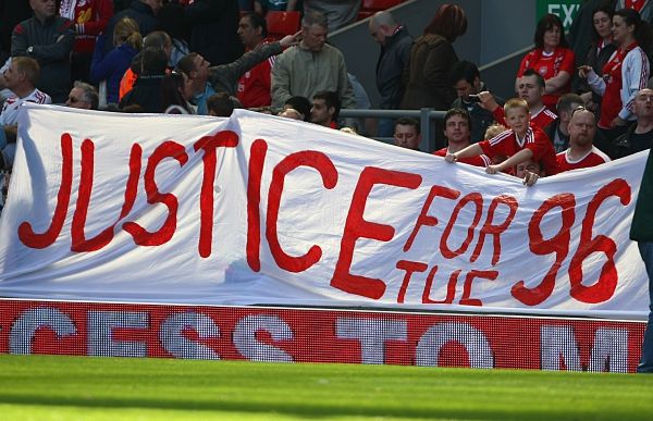 LIVERPOOL, ENGLAND - APRIL 11: Liverpool fans display banners in reference to the Hillsborough disaster during the Barclays Premier League match between Liverpool and Blackburn at Anfield on April 11, 2009 in Liverpool, England. (Photo by Clive Rose/Getty Images)
