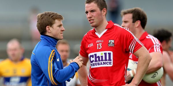 Munster GAA Football Senior Championship Semi-Final, Pairc Ui Rinn, Cork 14/6/2015 Cork vs Clare Clare's Podge Collins speaks to Colm O’Neill of Cork after the game Mandatory Credit ©INPHO/James Crombie