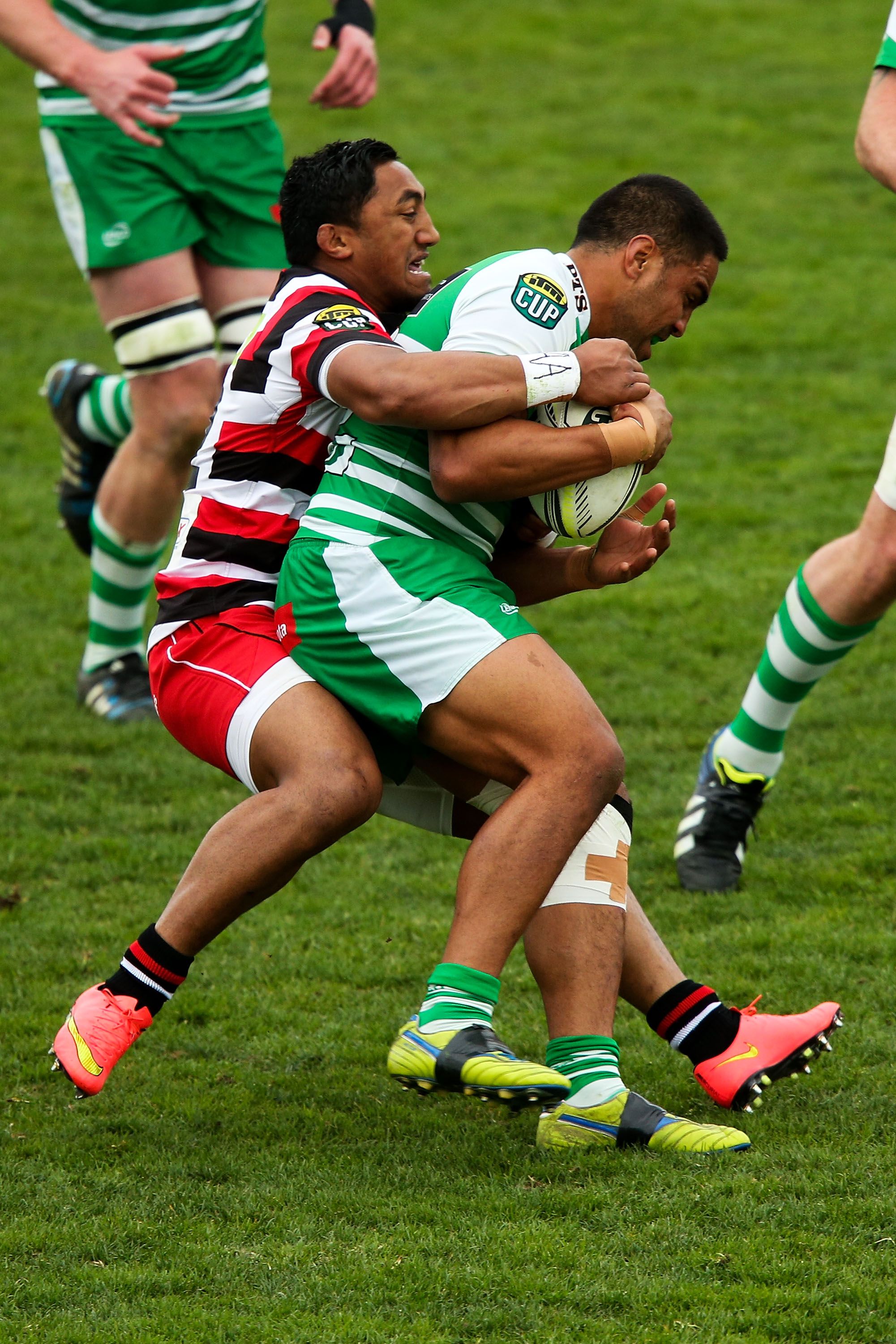 PALMERSTON NORTH, NEW ZEALAND - SEPTEMBER 07: Jaxon Tagavaitau of Manawatu is tackled by Bundee Aki of Counties Manukau during the ITM Cup match between Manawatu and Counties Manukau at FMG Stadium on September 7, 2014 in Palmerston North, New Zealand. (Photo by Hagen Hopkins/Getty Images)