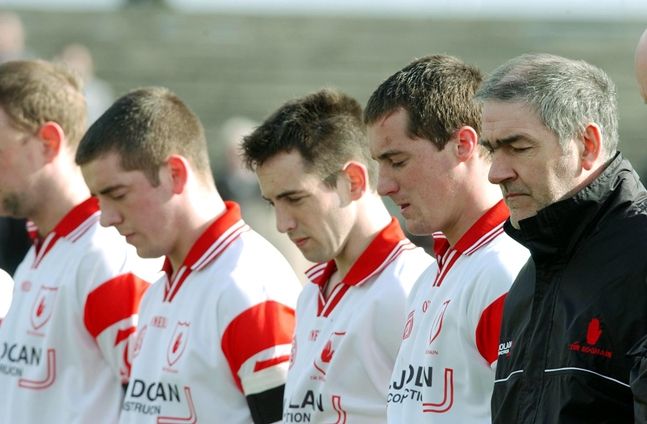 Players and manager observe a minutes silence before their game 14/3/2004