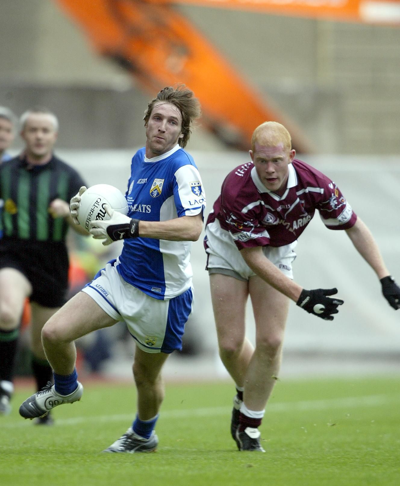 Leinster Senior Football Final Replay 24/7/2004 Laois vs Westmeath Colm Parkinson of Laois and Donal O'Donoghue of Westmeath Mandatory Credit ©INPHO/Donall Farmer