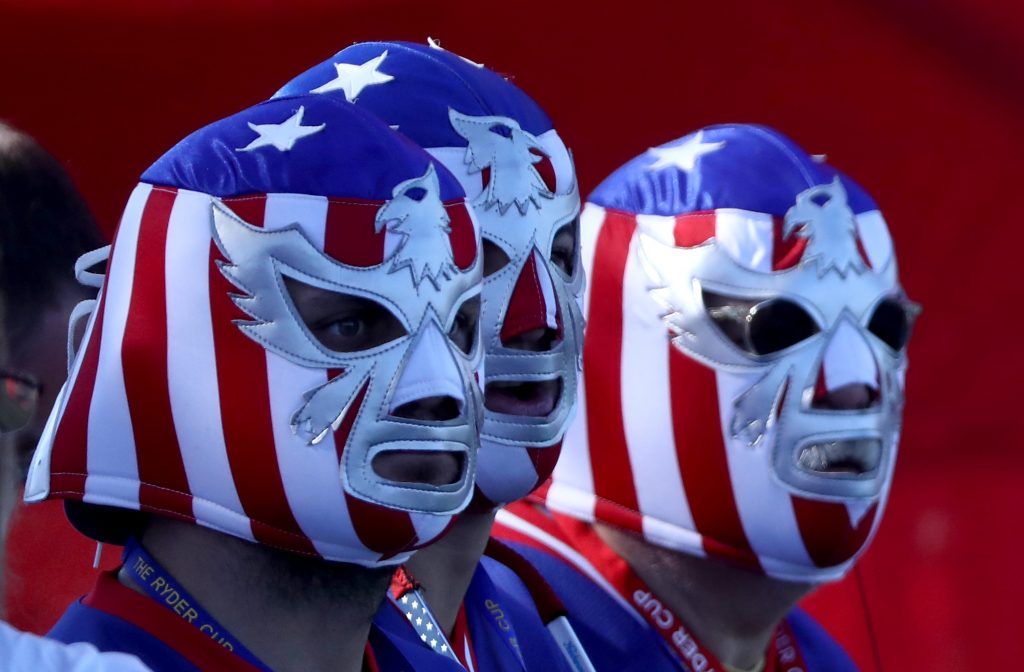 CHASKA, MN - OCTOBER 01: Fans wearing eagle lucha libre masks look on during afternoon fourball matches of the 2016 Ryder Cup at Hazeltine National Golf Club on October 1, 2016 in Chaska, Minnesota. (Photo by Sam Greenwood/Getty Images)