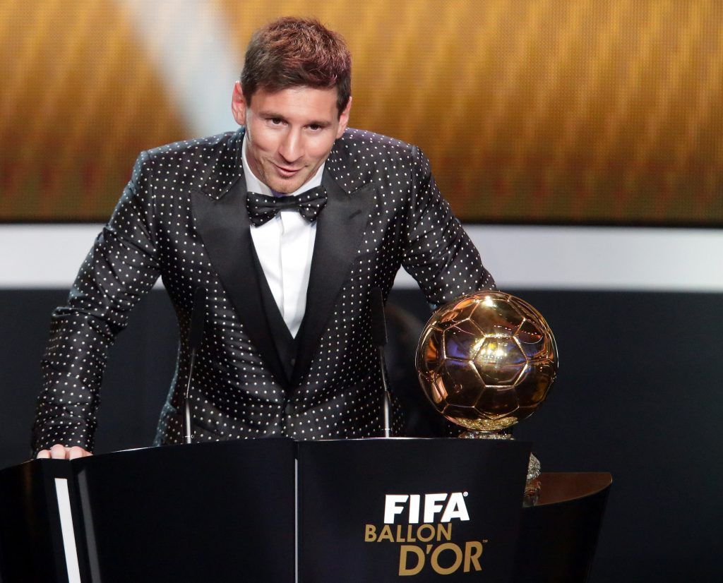 ZURICH, SWITZERLAND - JANUARY 07: Lionel Messi of Argentina receives the FIFA Ballon d'Or 2012 trophy on January 7, 2013 in Zurich, Switzerland. (Photo by Christof Koepsel/Getty Images)