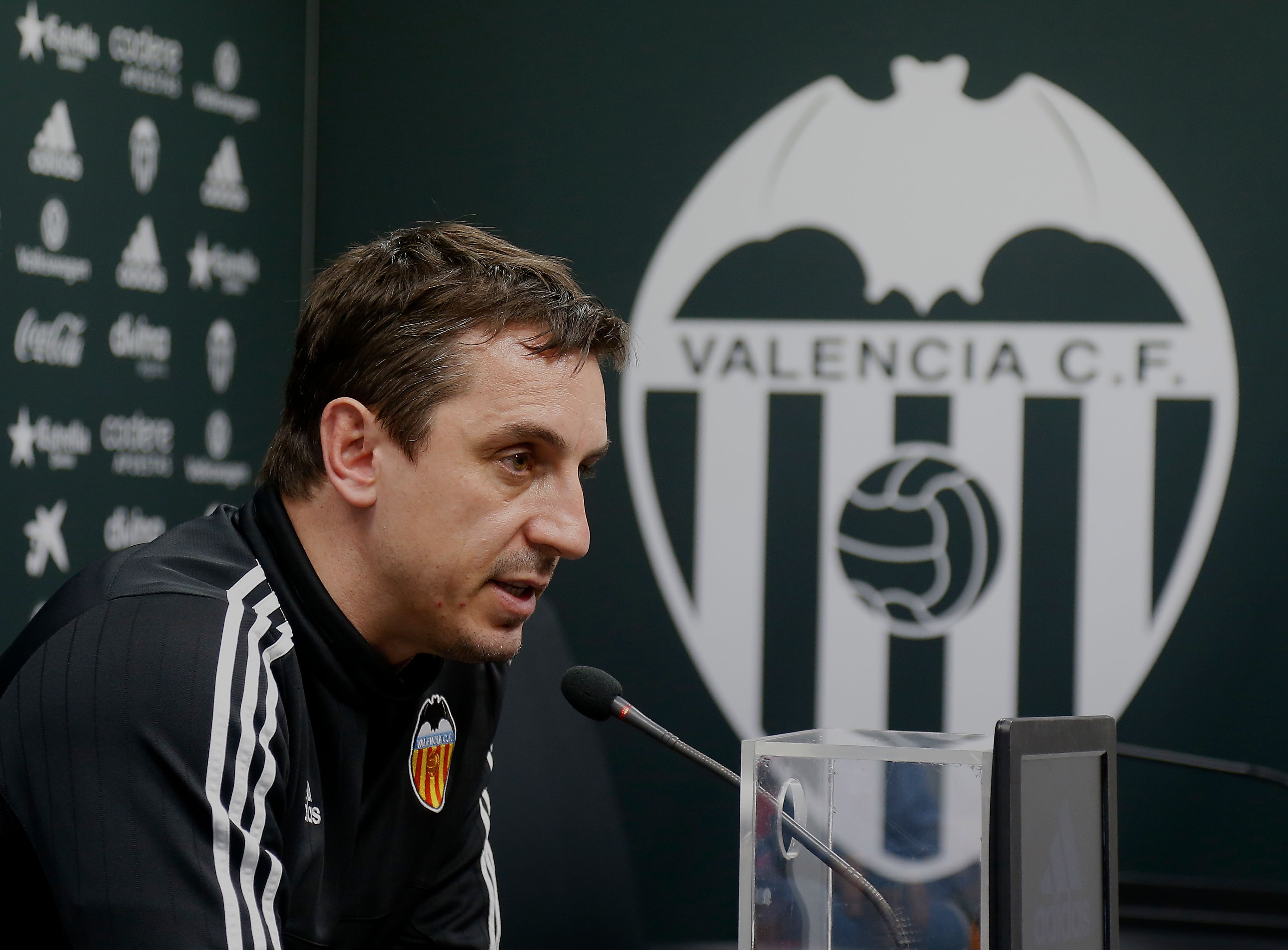 VALENCIA, SPAIN - FEBRUARY 09: Gary Neville manager of Valencia CF faces the media during a press conference ahead of Wednesday's Copa del Rey Semi Final, second leg match between Valencia CF and FC Barcelona at Paterna Training Centre on February 9, 2016 in Valencia, Spain. (Photo by Manuel Queimadelos Alonso/Getty Images)