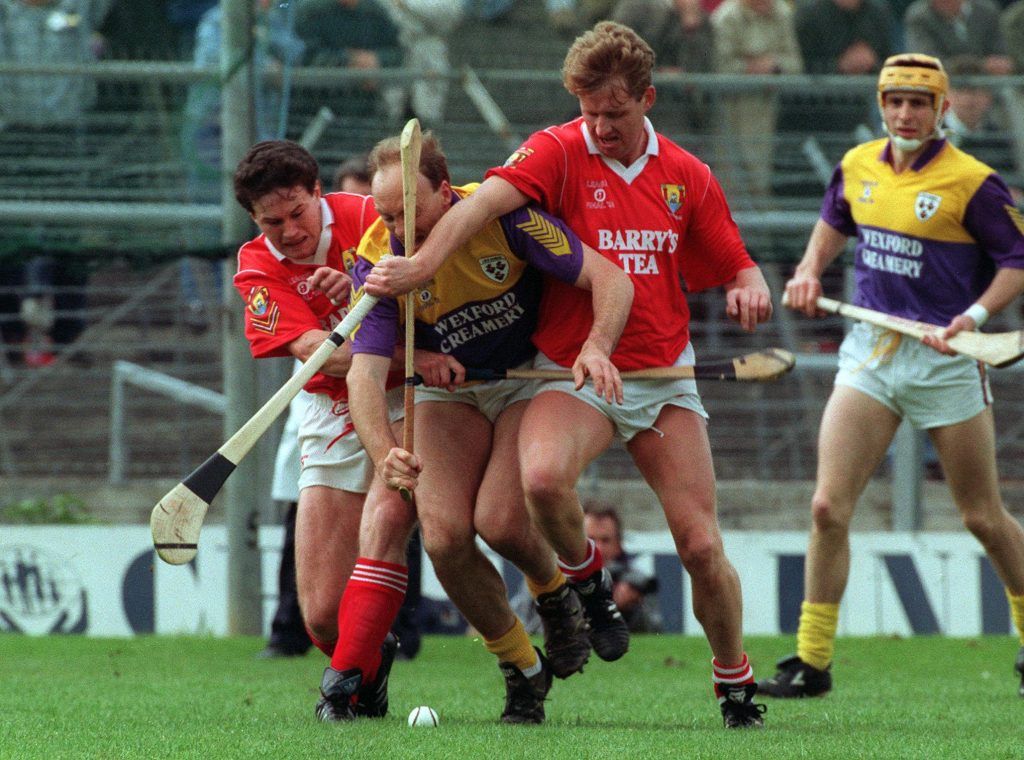 National Hurling League Final 2nd Replay Wexford vs Cork 1993 John O'Connor of Wexford is tackled by Denis Walsh and Jim Cashman of Cork Mandatory Credit ©INPHO