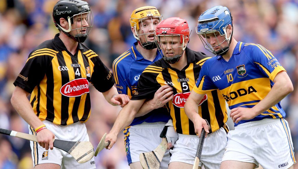 GAA Hurling All Ireland Senior Championship Semi-Final 19/8/2012 Tipperary vs Kilkenny Tipperary's Lar Corbett and Pa Bourke with Jackie Tyrrell and Tommy Walsh of Kilkenny Mandatory Credit ©INPHO/James Crombie