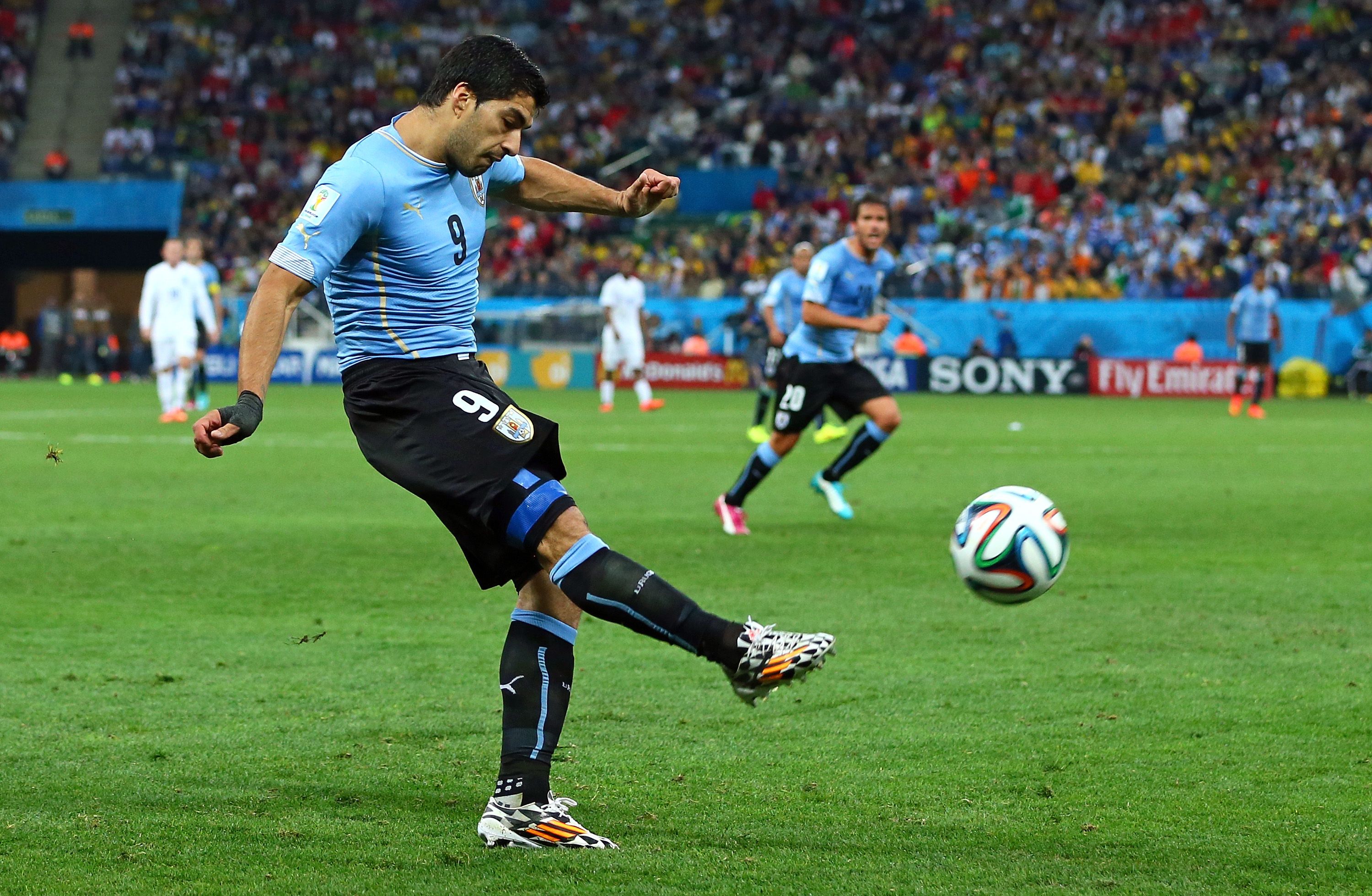 SAO PAULO, BRAZIL - JUNE 19: Luis Suarez of Uruguay kicks the ball during the 2014 FIFA World Cup Brazil Group D match between Uruguay and England at Arena de Sao Paulo on June 19, 2014 in Sao Paulo, Brazil. (Photo by Kevin C. Cox/Getty Images)