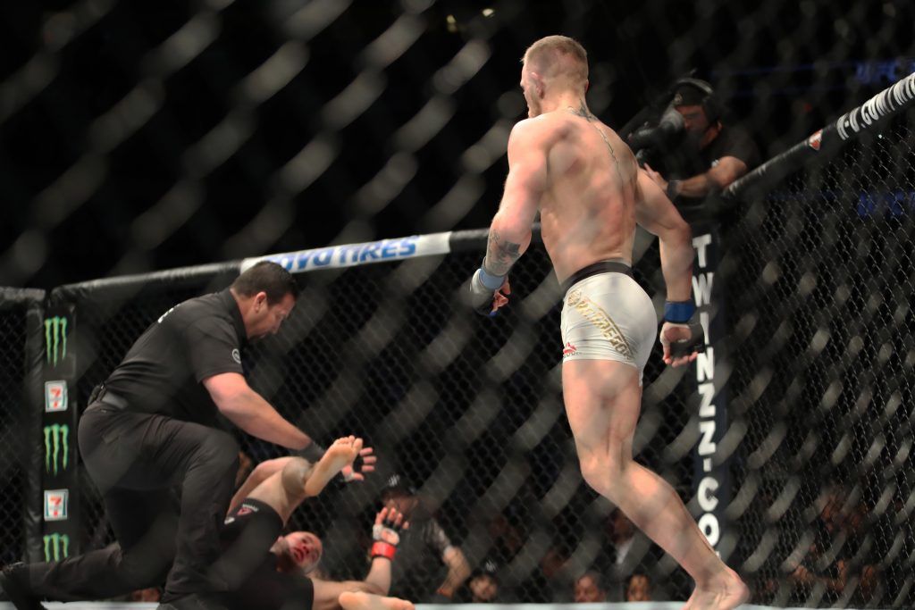 Conor McGregor knocks down Eddie Alvarez 12/11/2016