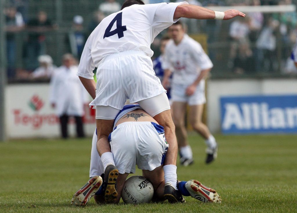 National Football League 8/4/2007 Kildare vs Laois Kildare's Aindriu Mac Lochlainn tackles Colm Parkinson of Laois Mandatory Credit ©INPHO/Cathal Noonan